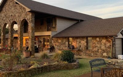 new rain gutter installation on stone house