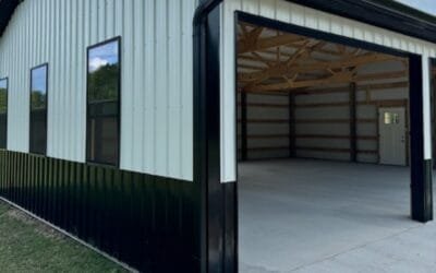 new black and white colored garage with newly installed rain gutter